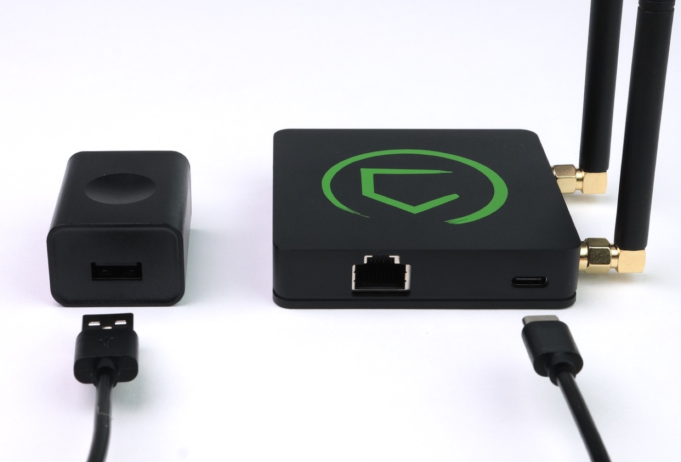 USB cable between the hub USB-C port and the power adapter, with the adapter still unplugged