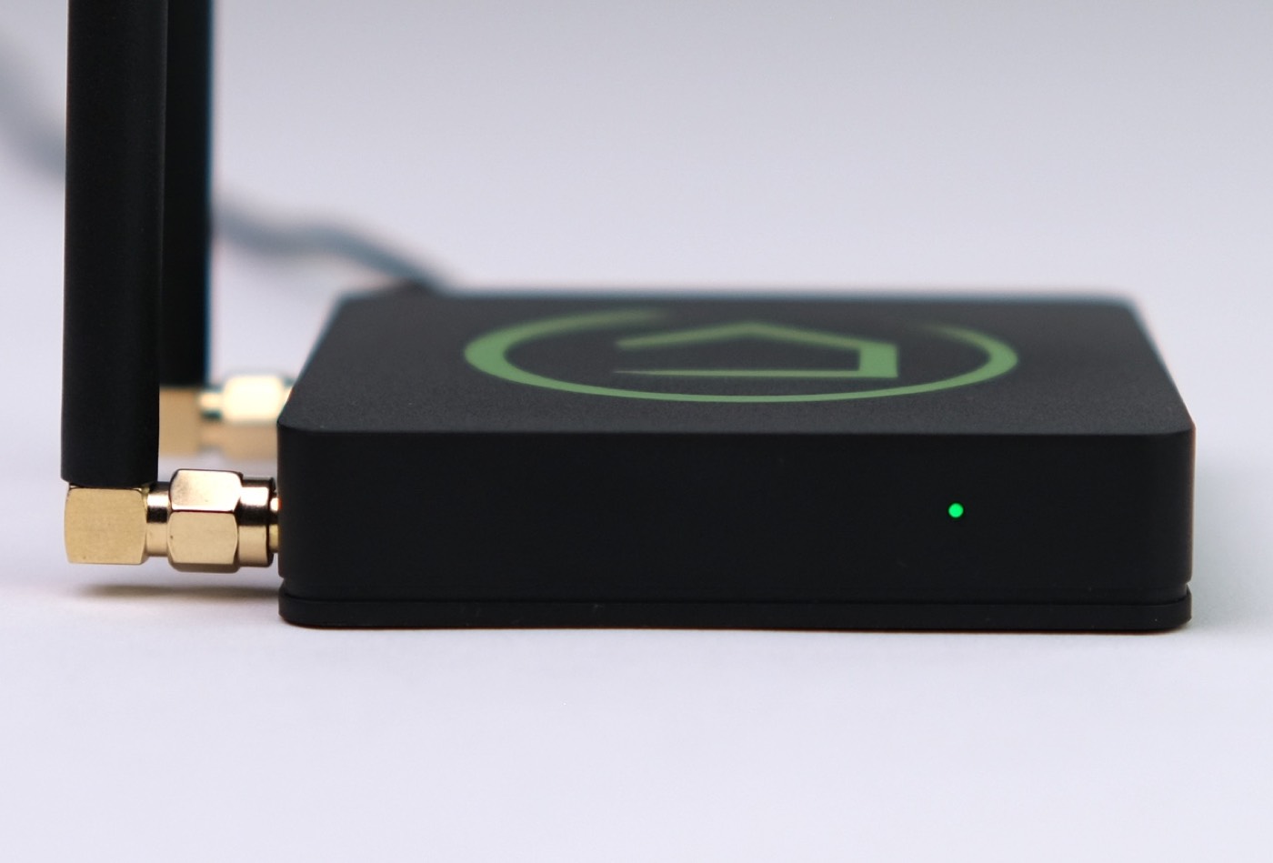 Hubitat Elevation hub powered on with a green LED indicator